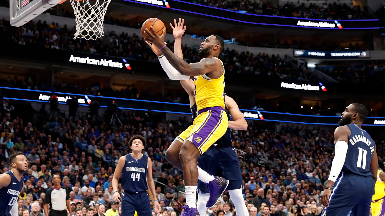 James, Doncic match triple-doubles, Lakers beat Mavs in OT